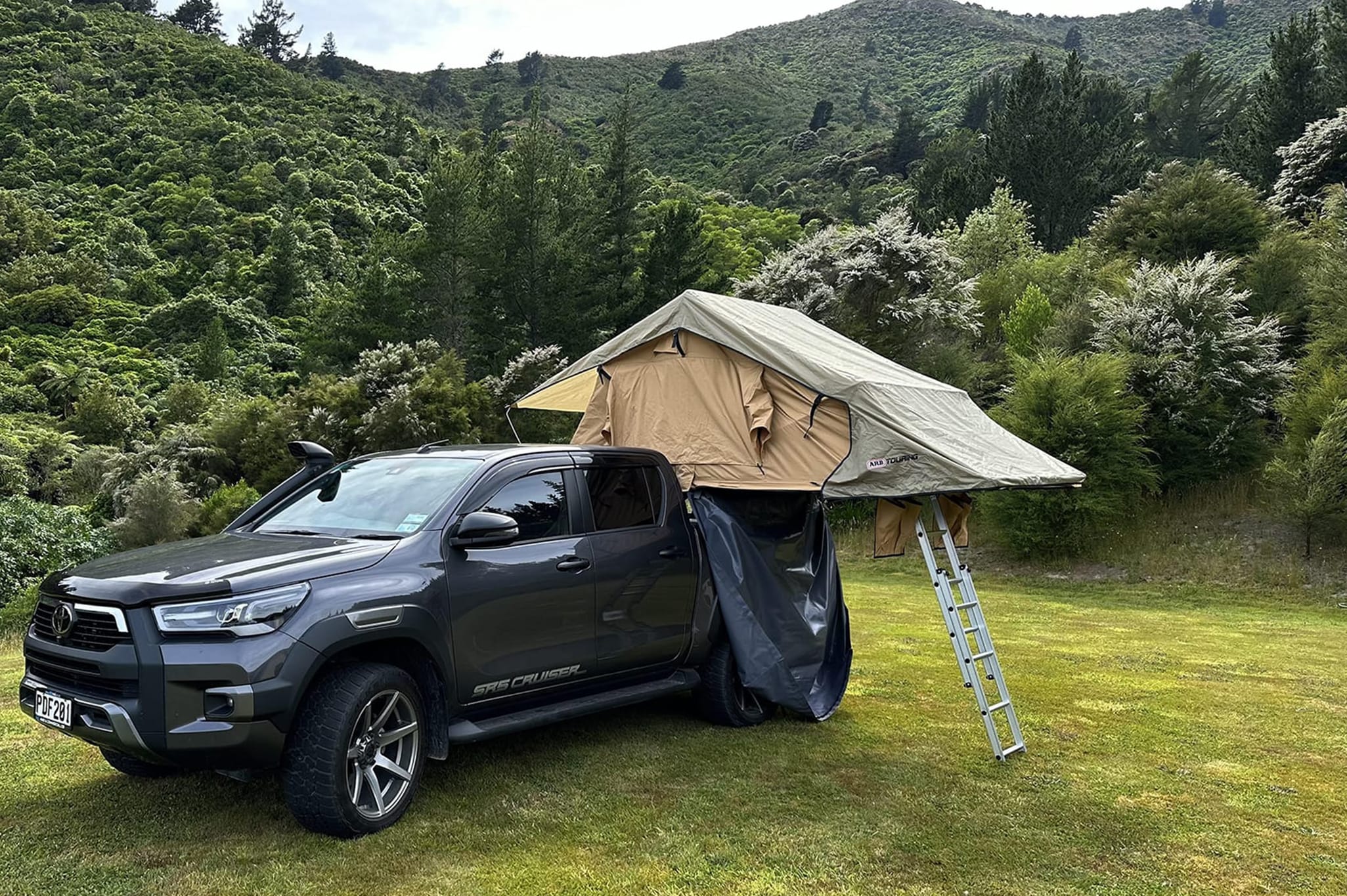 4WD Toyota Hilux SR5 Cruiser with rooftop tent available for rent in Christchurch, NZ